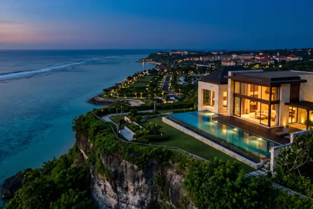 Nusa Dua resort villa with infinity pool and manicured tropical landscape